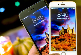 Holding phone castle screen candle - widescreen free wallpaper