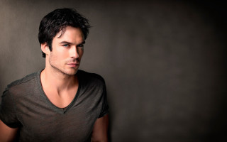 Man dark shirt black background - free portrait wallpaper