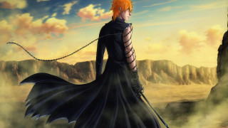 Man orange hair black dress - a desert area free wallpaper