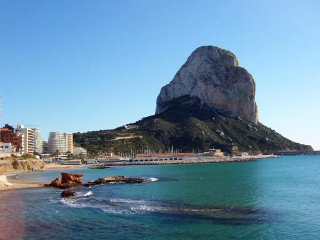 Beach mountain water buildings foreground - building free wallpaper