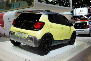 Small yellow car showroom woman - the background and a woman free wallpaper