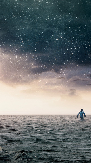Man floating ocean cloudy sky - a boat free wallpaper