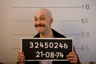 Man holding sign mustache mugshot - a sign free wallpaper