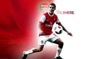 Man red white uniform soccer - uniform holding free wallpaper