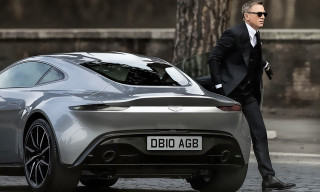 Man suit sunglasses walking car - a man in a suit and sunglasses free wallpaper