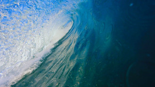 Wave breaking blue white bubbles - widescreen free wallpaper