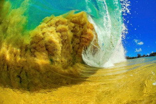 Breaking wave sandy beach blue - a blue sky in the foreground free wallpaper