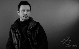 Man black jacket posing light - eric dinyer free wallpaper