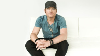 Man sitting white couch hat - eric taylor free wallpaper