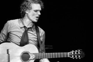 Man tie guitar black background - private press free wallpaper