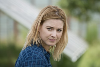 Blonde woman blue shirt serious - elisabeth collins free wallpaper