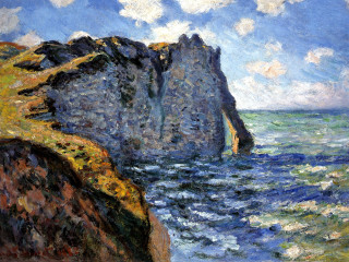 Rocky cliff ocean blue sky - a rocky cliff free wallpaper