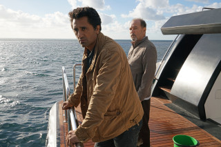 Two men boat looking camera - arthur sarkissian free wallpaper