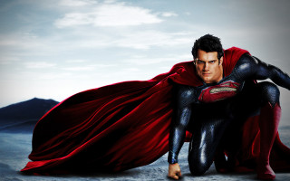 Superman crouching cape open hands - his hip free wallpaper