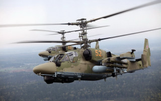 Military helicopter forest hillside flying - a military helicopter free wallpaper