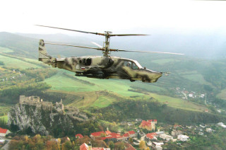 Helicopter flying city castle town - over a city free wallpaper