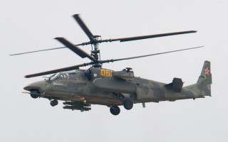 Military helicopter flying propellers number - a military helicopter free wallpaper