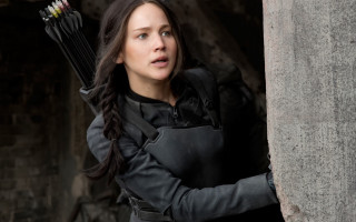 Woman holding bow arrow stone - a stone wall free wallpaper