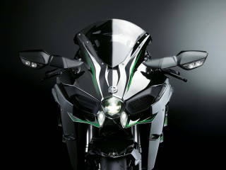 Motorcycle black background green white - the front of its free wallpaper