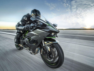 Motorcycle rider road sky clouds - a person riding free wallpaper