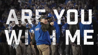 Man pointing crowd football helmet - a football helmet free wallpaper