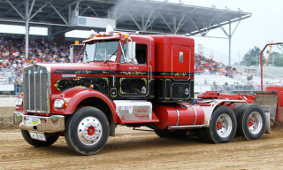 Red semi truck dirt road - western free wallpaper