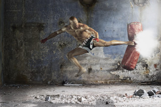 Man kicking punchingbag dirtyroom starrysky - real free wallpaper