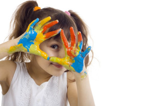 Little girl hands face covered - paint free wallpaper