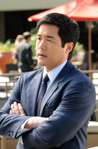 Man suit tie arms crossed 4 - front of him free wallpaper