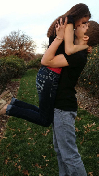 Man woman hugging field grass - a man and woman free wallpaper