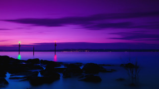 Purple blue sky lighttower rocks - sky free wallpaper