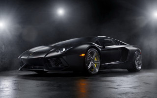 Black sports car yellow wheels 2 - a black body free wallpaper