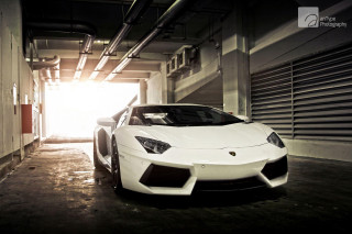 White sports car parking garage 14 - a parking garage free wallpaper