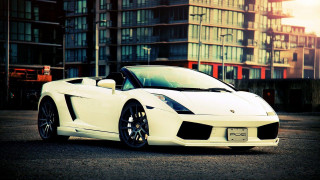White sports car tall building 2 - luxury free wallpaper