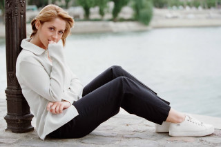 Elegant blonde woman stone wall - elegant pose free wallpaper