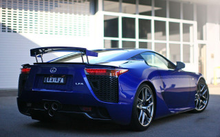 Blue sports car garage window - a large window free wallpaper