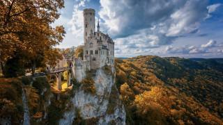 Castle cliff bridge trees cloudy - a cloudy sky above free wallpaper