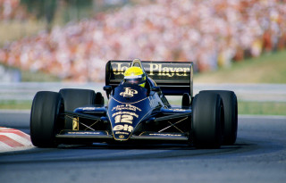 Man driving blue race car - a track free wallpaper