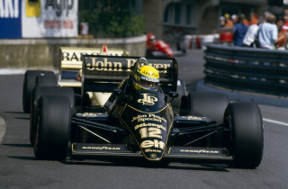 Racing car man stand blur - other car behind free wallpaper