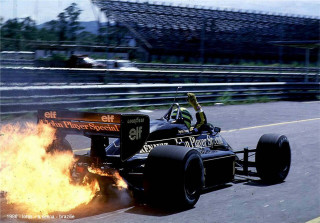 Man driving race car track - a race car free wallpaper