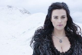 Woman long hair fur coat 3 - a snowy mountain free wallpaper