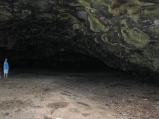 Person standing cave blue coat - a blue coat free wallpaper