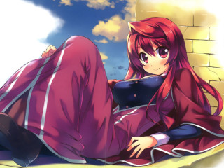 Woman laying ground brick wall - the sky behind her free wallpaper