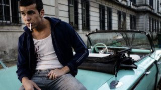 Man sitting blue car smoking - viennese actionism free wallpaper