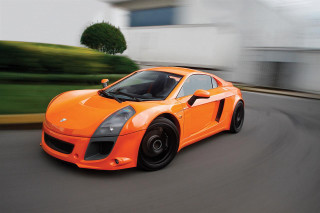 Bright orange sports car blurry 2 - orange free wallpaper