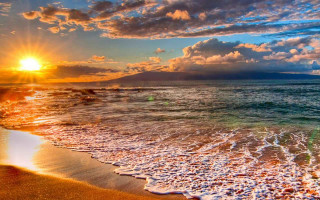 Sunset ocean waves mountain clouds - a sunset over the ocean free wallpaper