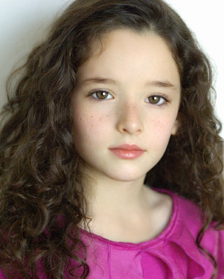 Young girl curly hair pink - a pink shirt free wallpaper