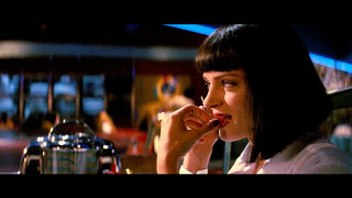 Woman eating pizza cityscape cinematic - a man in the background free wallpaper
