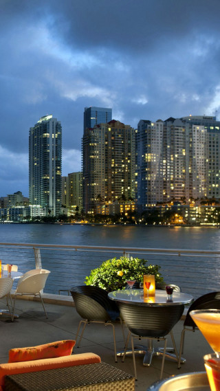 City skyline night water restaurant - a matte painting free wallpaper