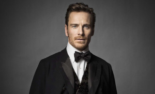 Man tuxedo bowtie posing dark - a gray backdrop free wallpaper